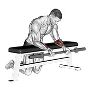 Palms up wrist curl over a bench con barra